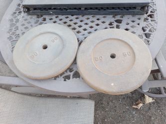 2 50 lbs Iron Plates