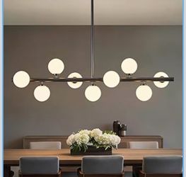 Brand New 9 light Linear Chandelier, globes included
