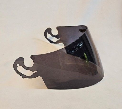Arai SAI Face Shield Dark fits the Arai Corsair V, Defiant, Defiant Pro-Cruise, RX-Q, Signet-Q, Signet-Q Pro-Cruise and Vector 2 Helmets, and is desig