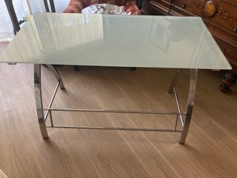 Desk and chair $40 Frosted glass top with chrome legs / faux leather chair