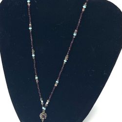 Gold toned necklace w/ multi-colored beads (wine colored, simulated turquoise, gold)  16”