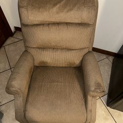 Reclines, Swivels & Rocks Great! Very Comfortable…Can Put A Chair Cover On It.  Easy To Move