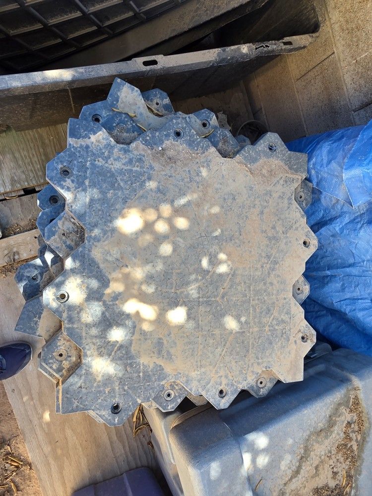 Interlocking hard plastic deck tiles, putting green base