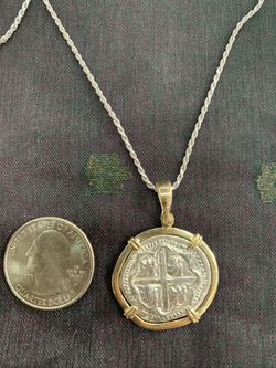 Atocha silver coin pendant in gold bezel with silver rope chain