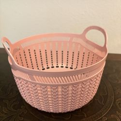 Cute pink woven plastic storage basket with handles