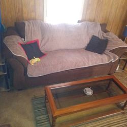 Dark Brown Couch With End Tables And Lamp And Coffee Table 