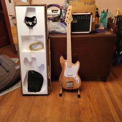 Electric Bass Guitar  And Amplifier 