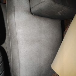 Couch Gray and corner style cabinet