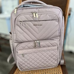Backpack. Plane. Travel. Spacious. Beautiful soft pink.