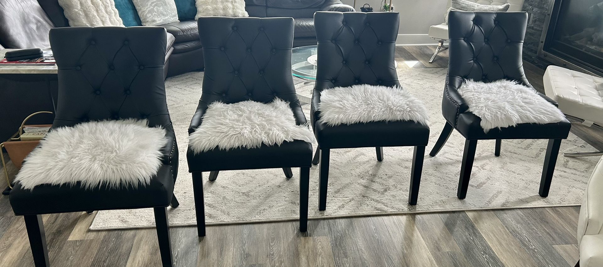 Four black dining chairs like brand NEW bought the wrong chairs. They are $80 each.