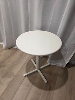 White metal round cafe table for two, 24"