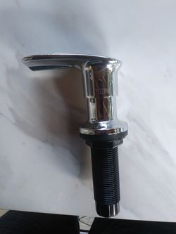 Kitchen sink soap dispenser