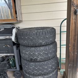 A set of 4 Goodyear Wrangler DuraTrac all-terrain tires, size 265/70R16, 16/32".