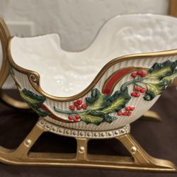 Porcelain decorative sleigh titled 'Noel Classique' by Fitz and Floyd