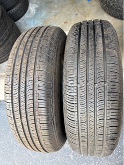Set of 2 nice tires 235/75/15 ( We install & balance)