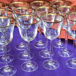 Vintage Set of 12  Mikasa Wheaton gold-rimmed crystal water goblets, featuring a distinctive hand-blown design with a gilded edge.  G10L020
