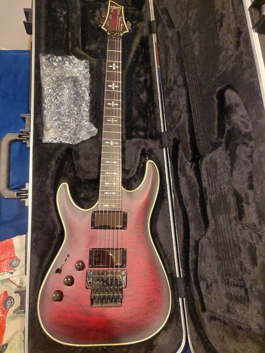 Left-handed Schecter C-1FR M in Crimson Red Burst