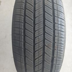 Bridgestone In Good Condition One Tire 215/50-18.      75% Tread