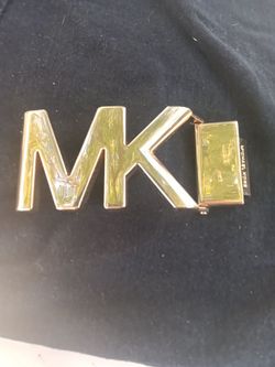 Mk belt buckle