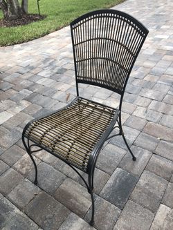 Set of 4 sturdy medal frame chairs with bamboo seating and backs. These are your grandfather’s chairs, made to last !