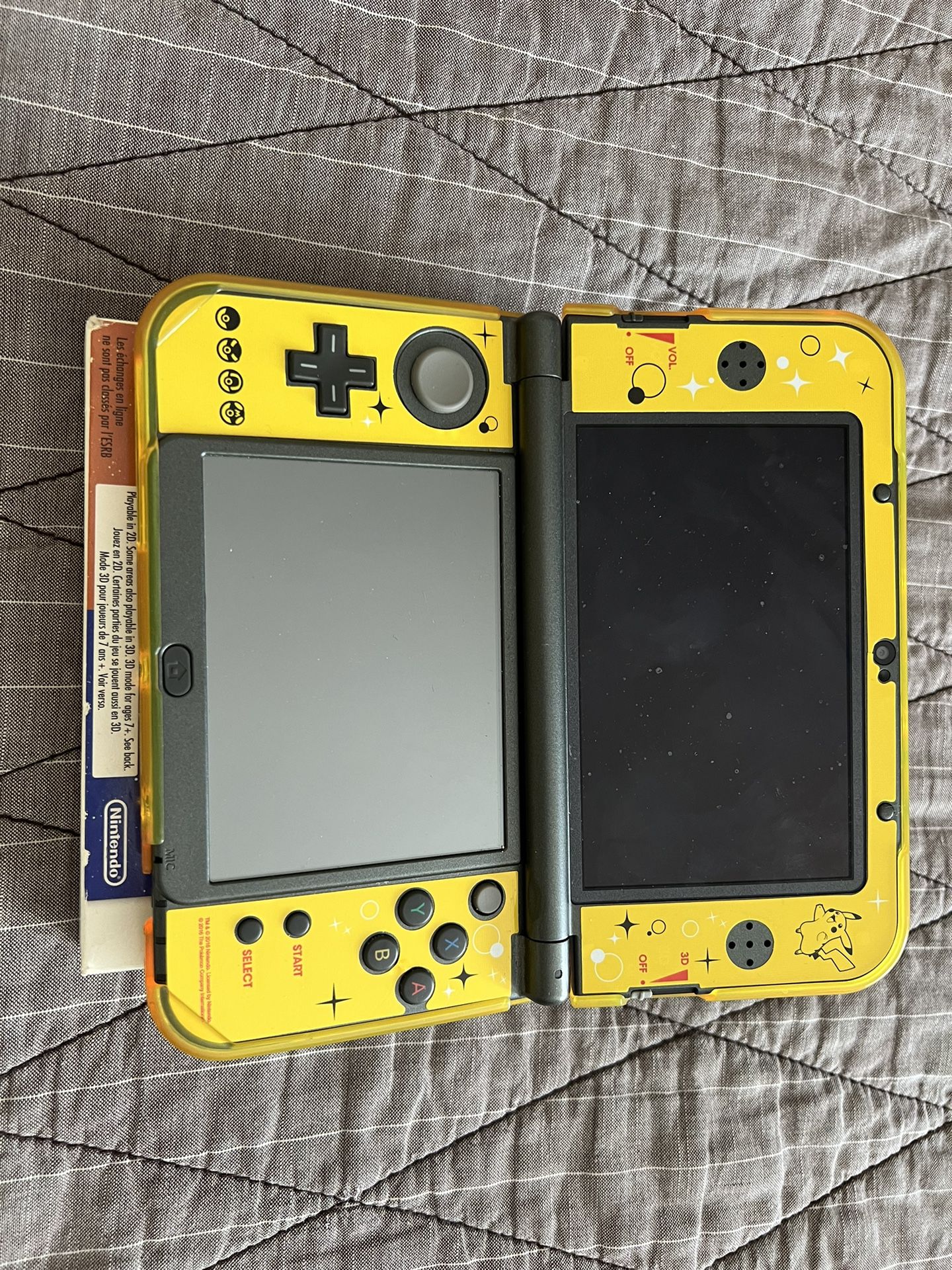 Nintendo 3ds XL With Pikachu Stickers And Case. Used Like New. Includes Pokemon Sun And Moon Games And Pikachu Game Holder 