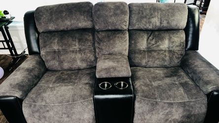 Manual recliner couch , grey in colour