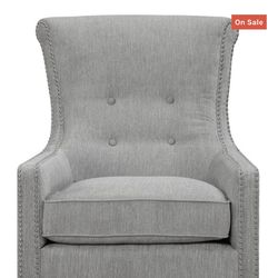 Gray high back accent chair with nailheads