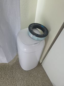 Infant / toddler trash dispenser