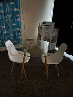 Glass table with 3 table chairs