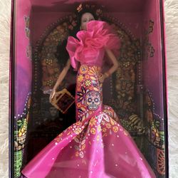 Bar bie Signature Fashion Doll, 2023 Dia de Muertos Collectible Wearing Ruffled Pink Gown & Holding Tiny Ofrenda, Includes Doll Stand $65.00