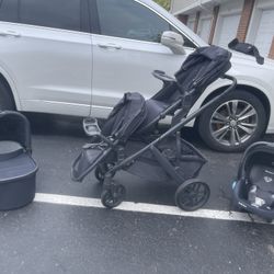 3 pieces  Uppa baby double stroller with car seat, bassinet, snack trays, and adapters.