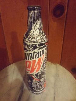 Unopened aluminum dragon mountain dew bottle