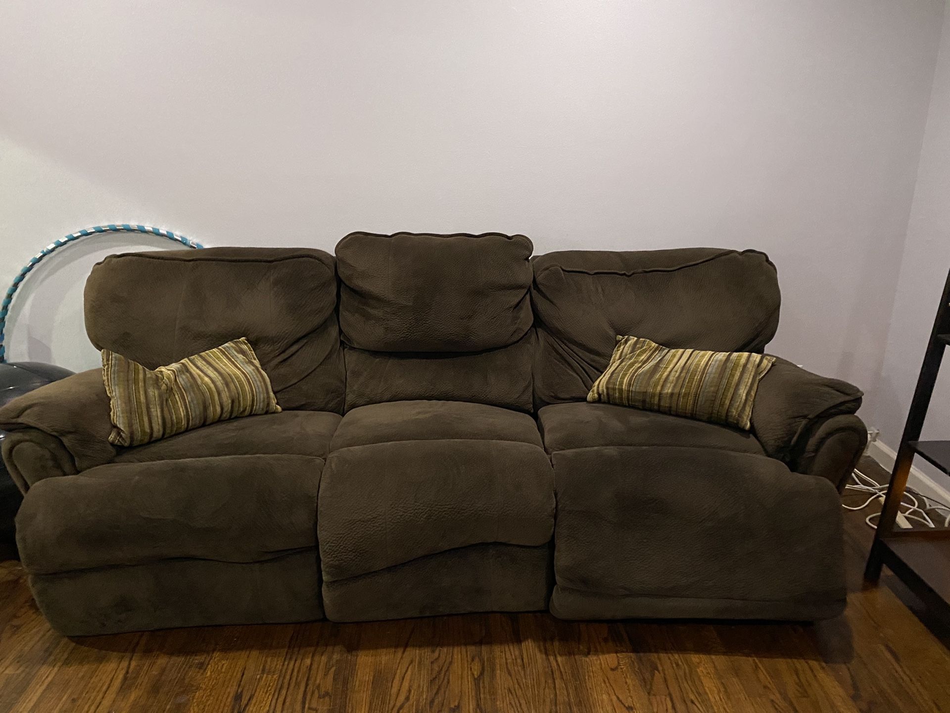 Free reclining couch and reclining love seat available Now !