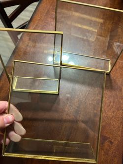 3 gold and glass frames