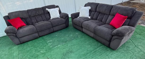 Beautiful dark gray reclining sofa can be delivered for an additional cost Presio 400