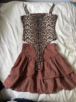 Leopard Print Bodysuit  size small and Ruffle Skirt Set