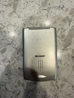 Sharp Wizard OZ-290 Electronic Organizer. Used. Tested. I put new batteries in and tested the back light and sound. All appears to be working. I have