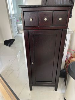 Tall bathroom storage cabinet