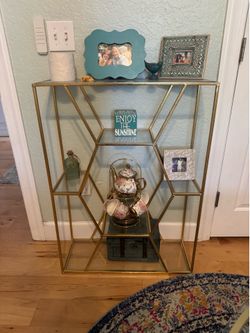 Geometric gold metal shelf