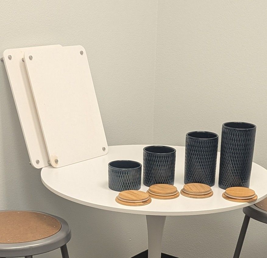 Navy Ceramic Canister Set (4 pcs) + 2 Wood Counter Boards – $20