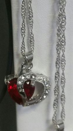 Stainless steel heart pendant brand new with tags Ruby no negotiations for Monoprice