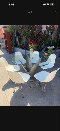 Contemporary modern dinner table with six chairs