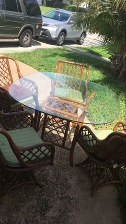 Glass table and 4 swivel chairs