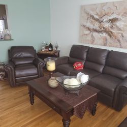 Jennifer's convertible 100% Leather sofa and recliner With 2 Tables. 
