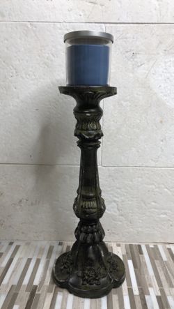 Distressed resin candle holder...