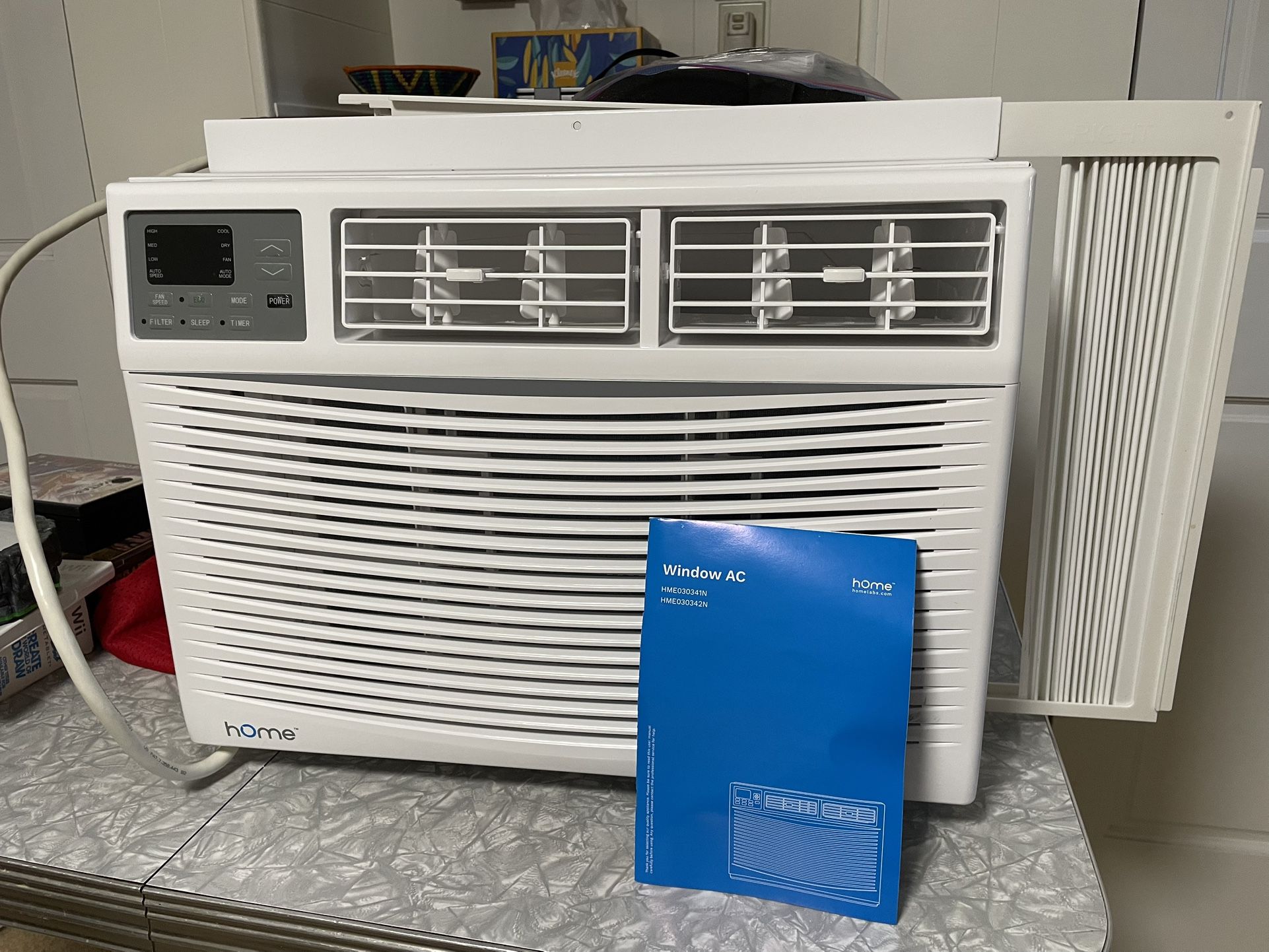 Window Unit Air Conditioner w/ Remote. Brand: Home