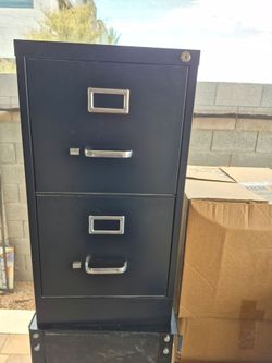 Two drawers file cabinet with keys in good condition
