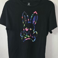 Psycho Bunny graphic t-shirt, specifically identified as the Bradley Graphic Tee. This brand is known for its signature logo featuring a bunny skull a