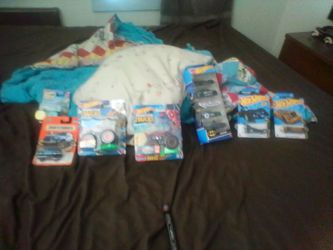 Assorted Hot Wheels, Matchbox 50 all together. There is 2 monster trucks.93% are in the boxes. Never opened,