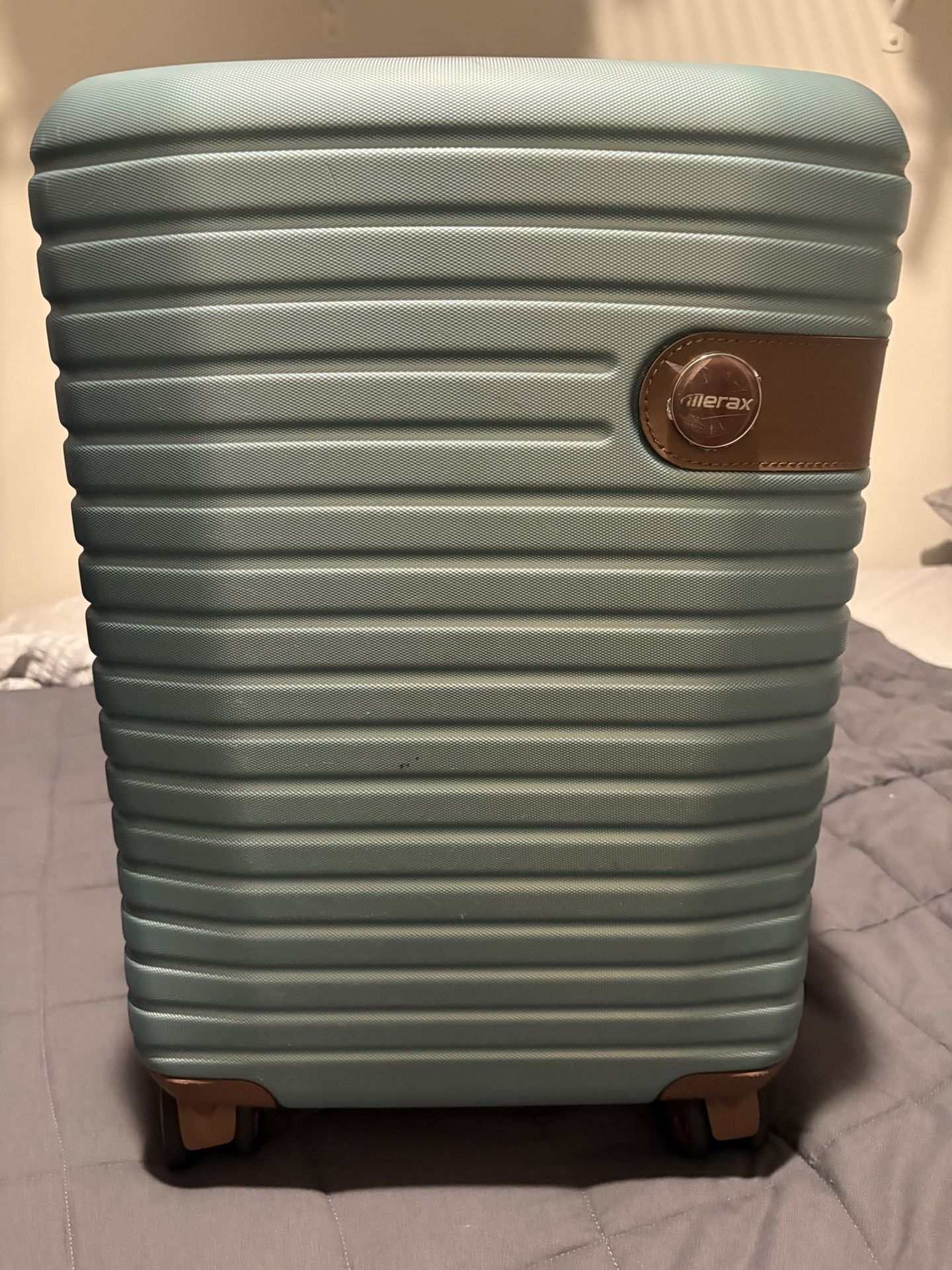 Light Blue Carry On luggage